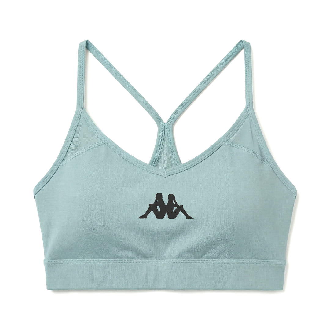 Haut de sport bleu moulant pour femme avec empiècements en mesh main