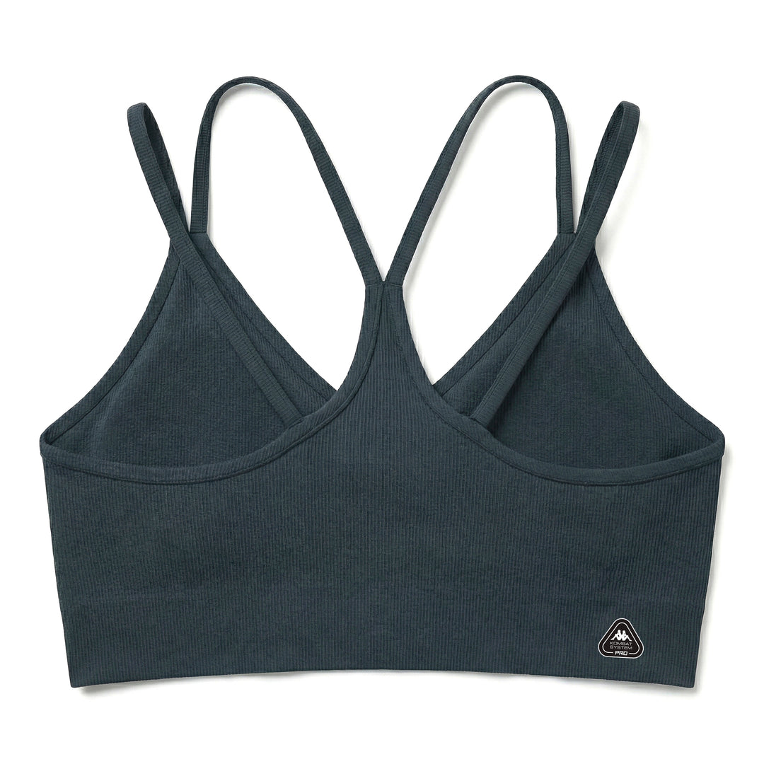 Haut d'entraînement sans coutures bleu pour femme main