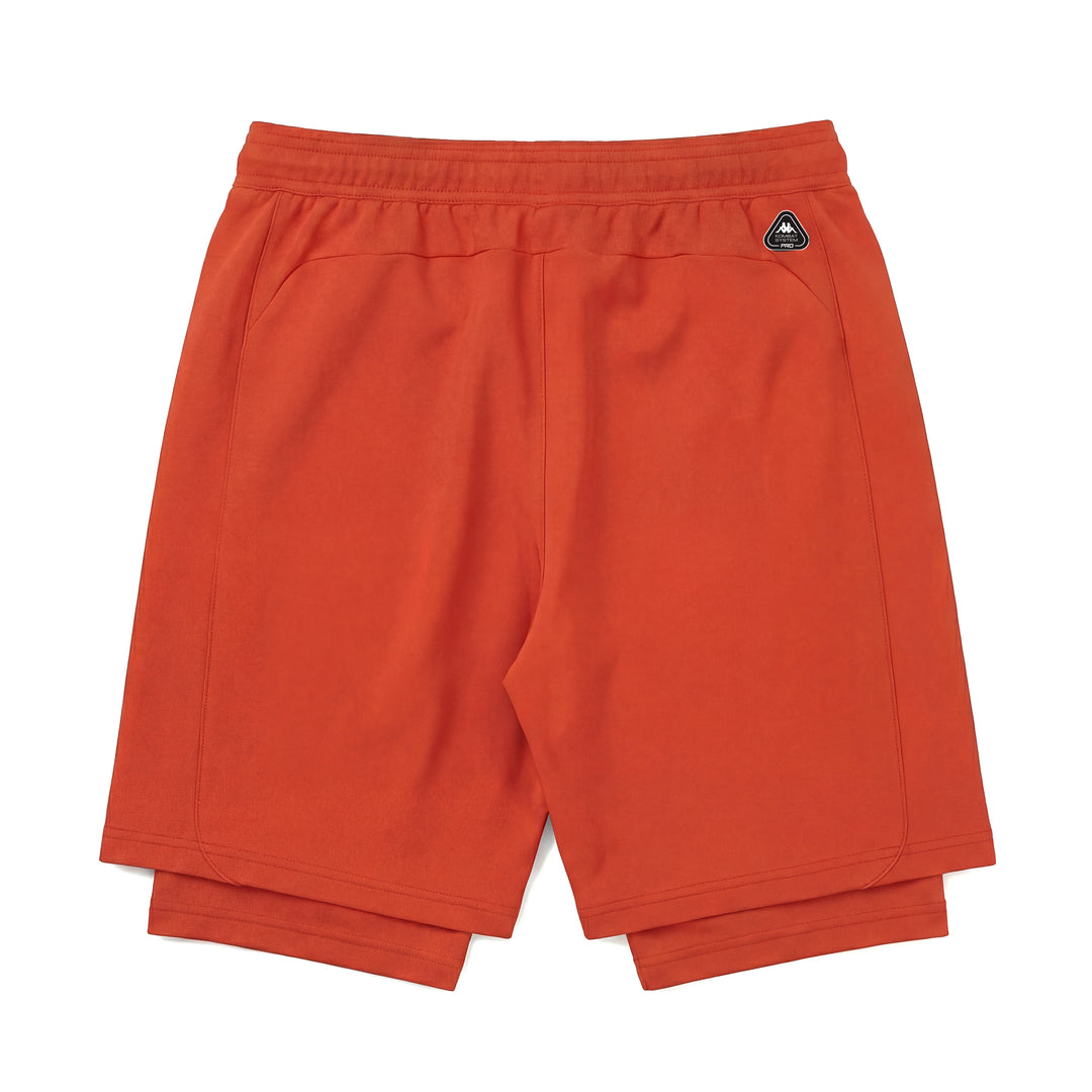 Pantalones cortos deportivos ajustados de color naranja para hombre confeccionados en tejido elástico tejido main