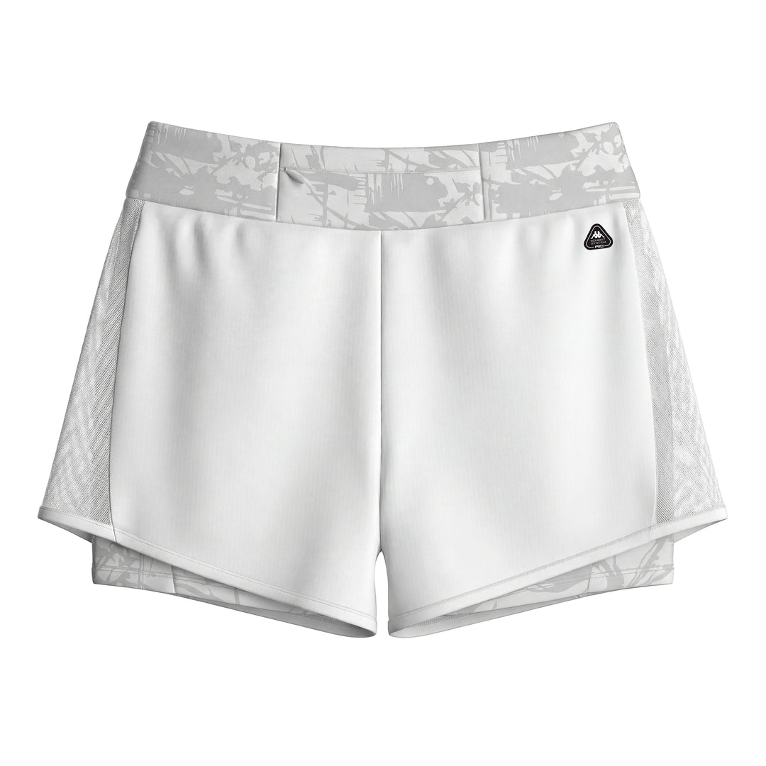 Short d'entraînement blanc pour femme, coupe ajustée, avec empiècements en mesh main