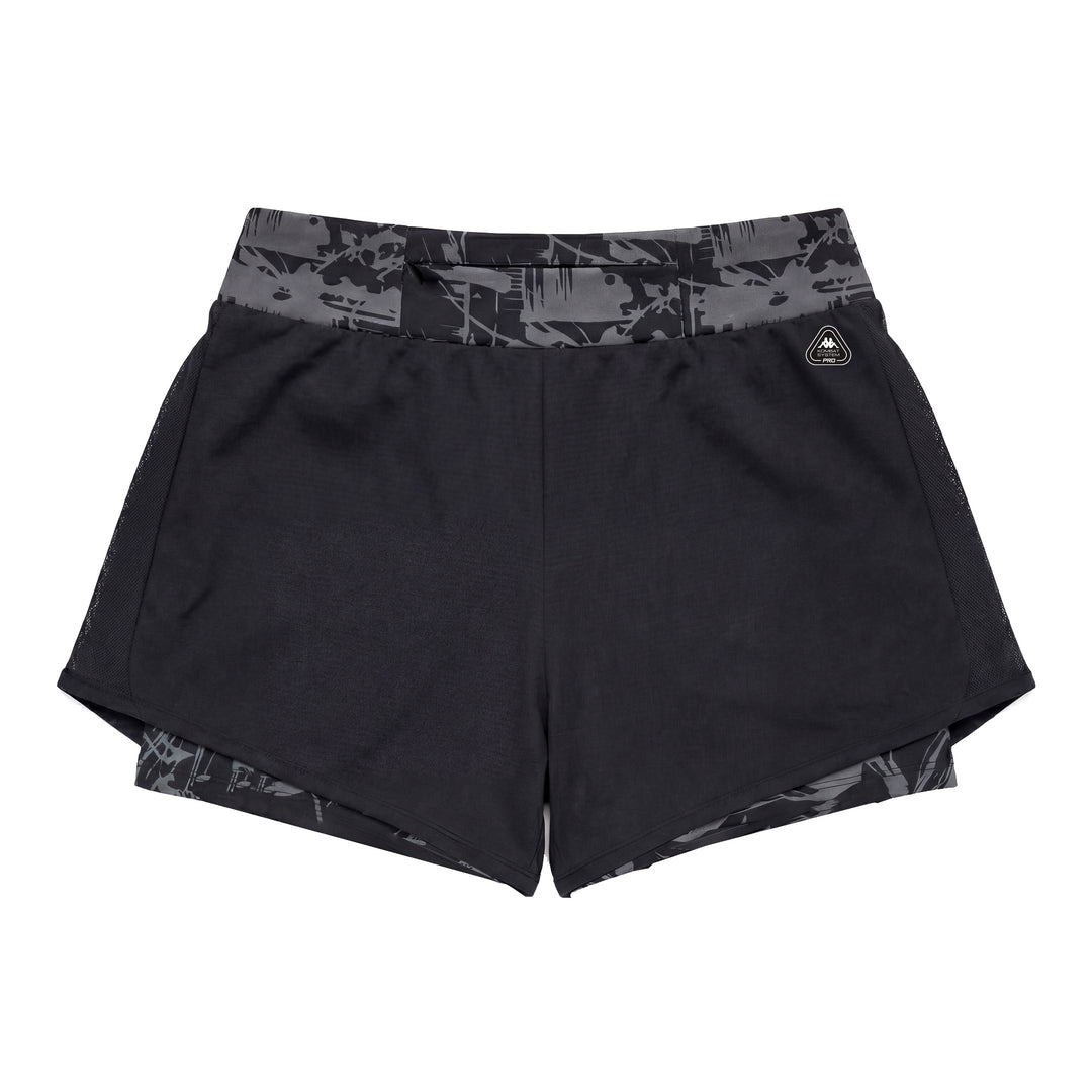 Pantalones cortos de entrenamiento ajustados y elásticos para mujer de color negro con inserciones de malla main