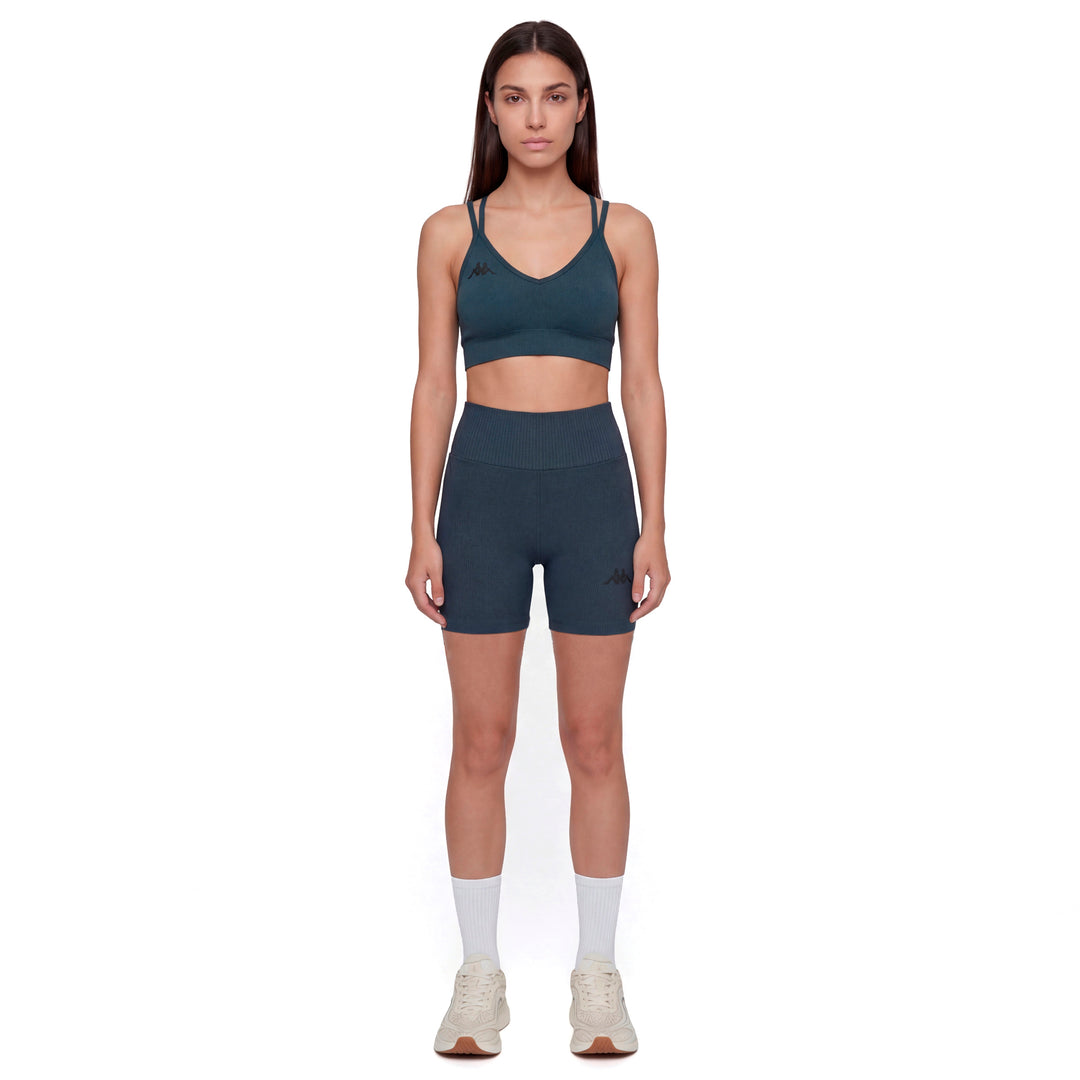 Pantalones cortos de entrenamiento de compresión sin costuras ajustados al cuerpo de color azul para mujer 01