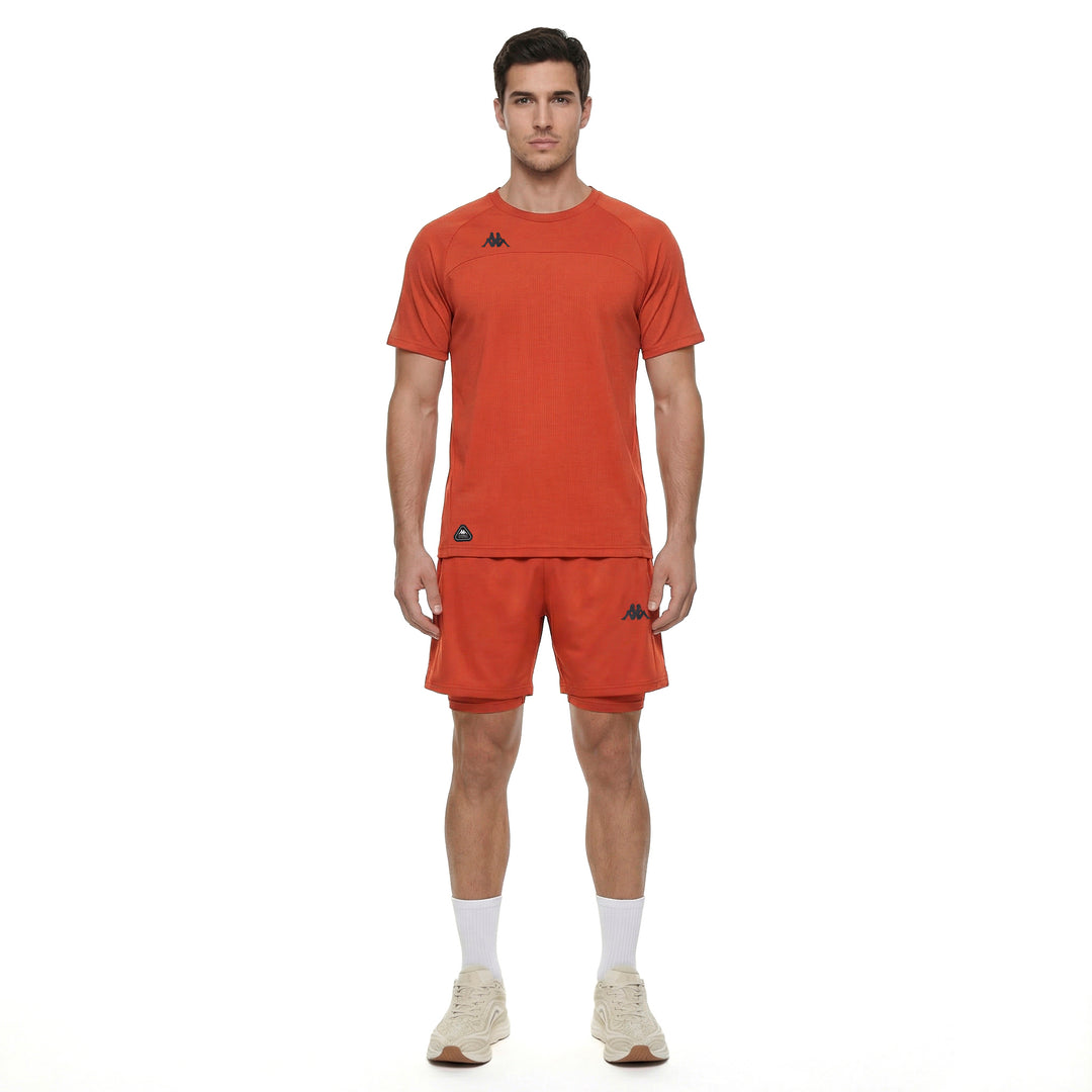 T-shirt d'entraînement sans coutures, coupe classique, orange pour homme main