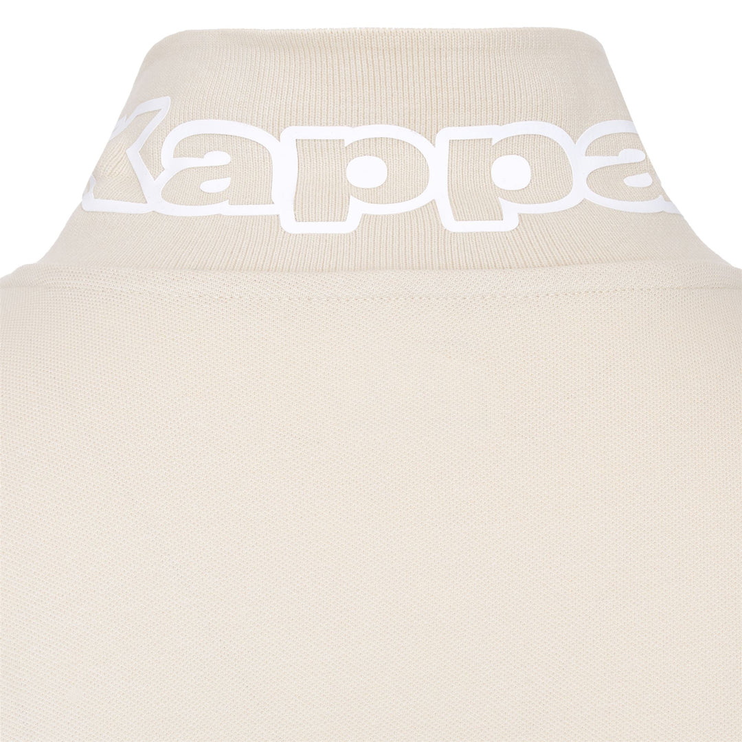 Polo beige pour homme, coupe classique, en coton. main