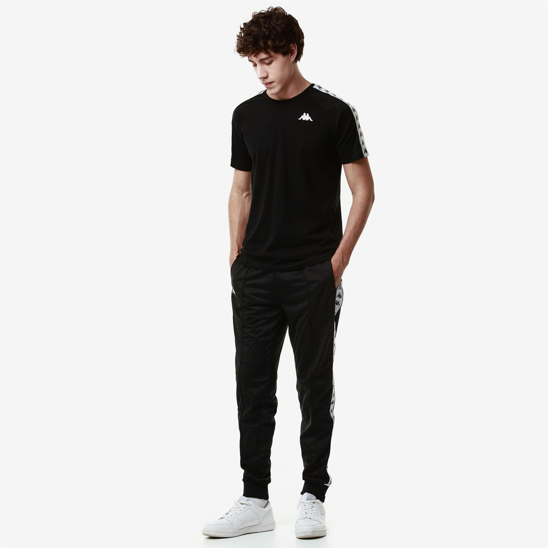 Pantalones deportivos para hombre negros de corte ajustado en tricot cepillado 01