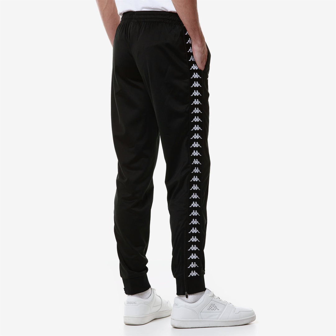 Pantalones deportivos negros de tricot ajustados para hombre con bolsillos laterales main