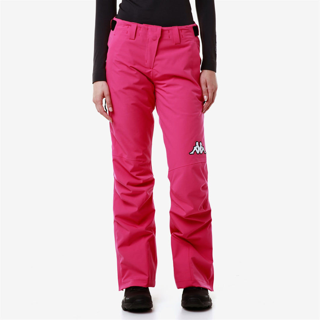 Pantalon de ski imperméable rembourré coupe slim pour femme, couleur fuchsia main