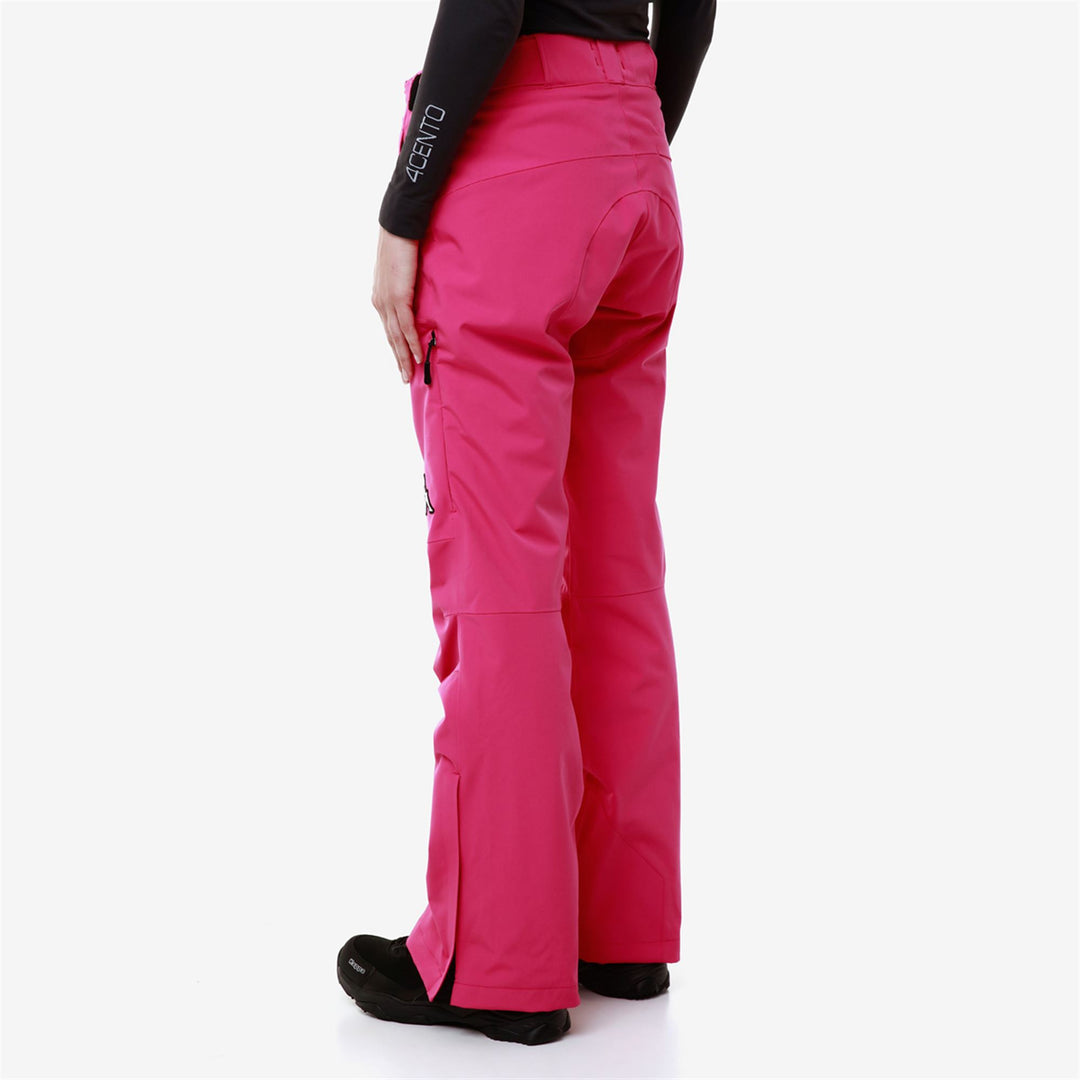 Pantalon de ski imperméable rembourré coupe slim pour femme, couleur fuchsia main