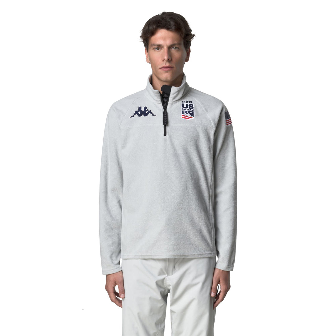 Jersey de esquí unisex gris de corte ajustado con media cremallera y forro polar. 01