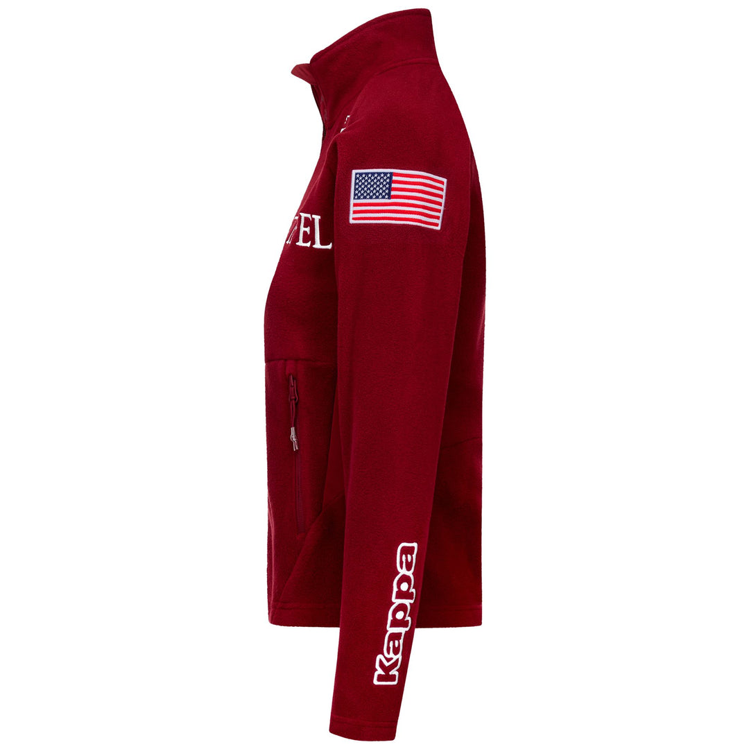 Giacca in pile rossa da donna con inserti elasticizzati e tasche con cerniera main