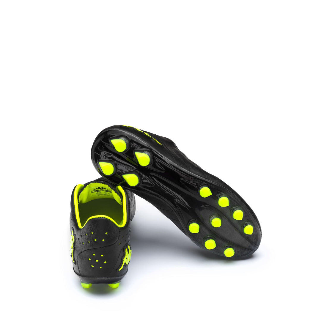 Botas de fútbol de corte bajo para hombre, color negro neón amarillo, para terrenos firmes main