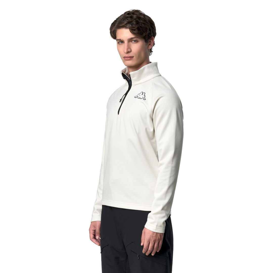 Chaqueta polar unisex blanca con media cremallera y corte entallado main