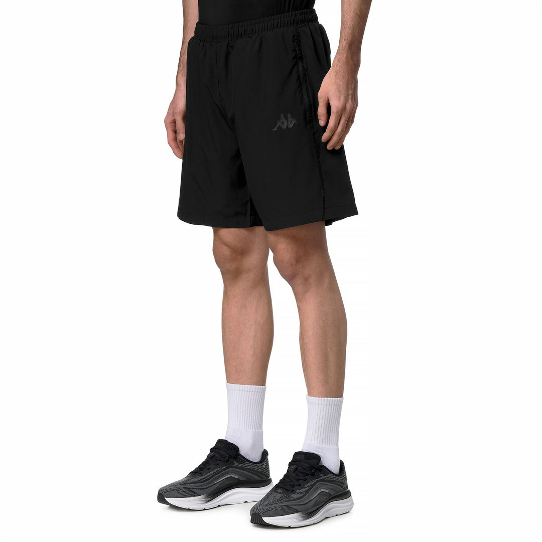 Short de sport noir pour homme, coupe ajustée, en tissu extensible tissé main