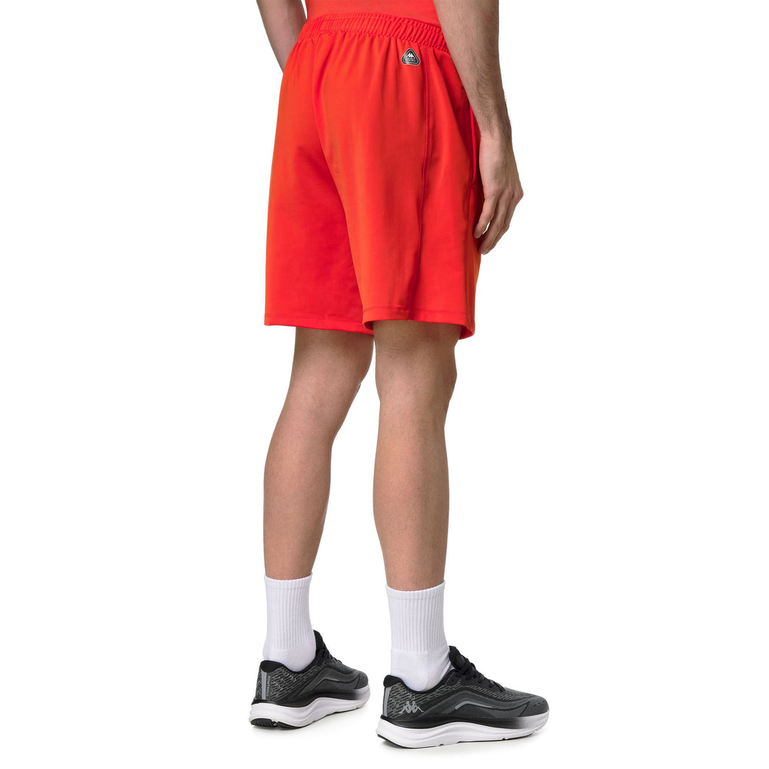 Pantaloncini da allenamento da uomo arancioni a vestibilità regolare in jersey tecnico main