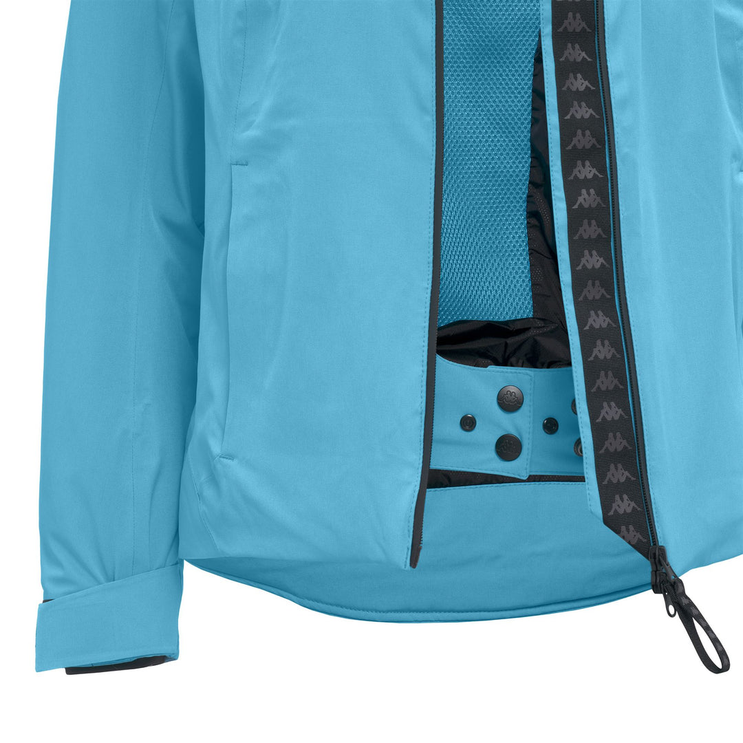 Veste de ski rembourrée bleue pour femme, coupe ajustée, avec protection imperméable main