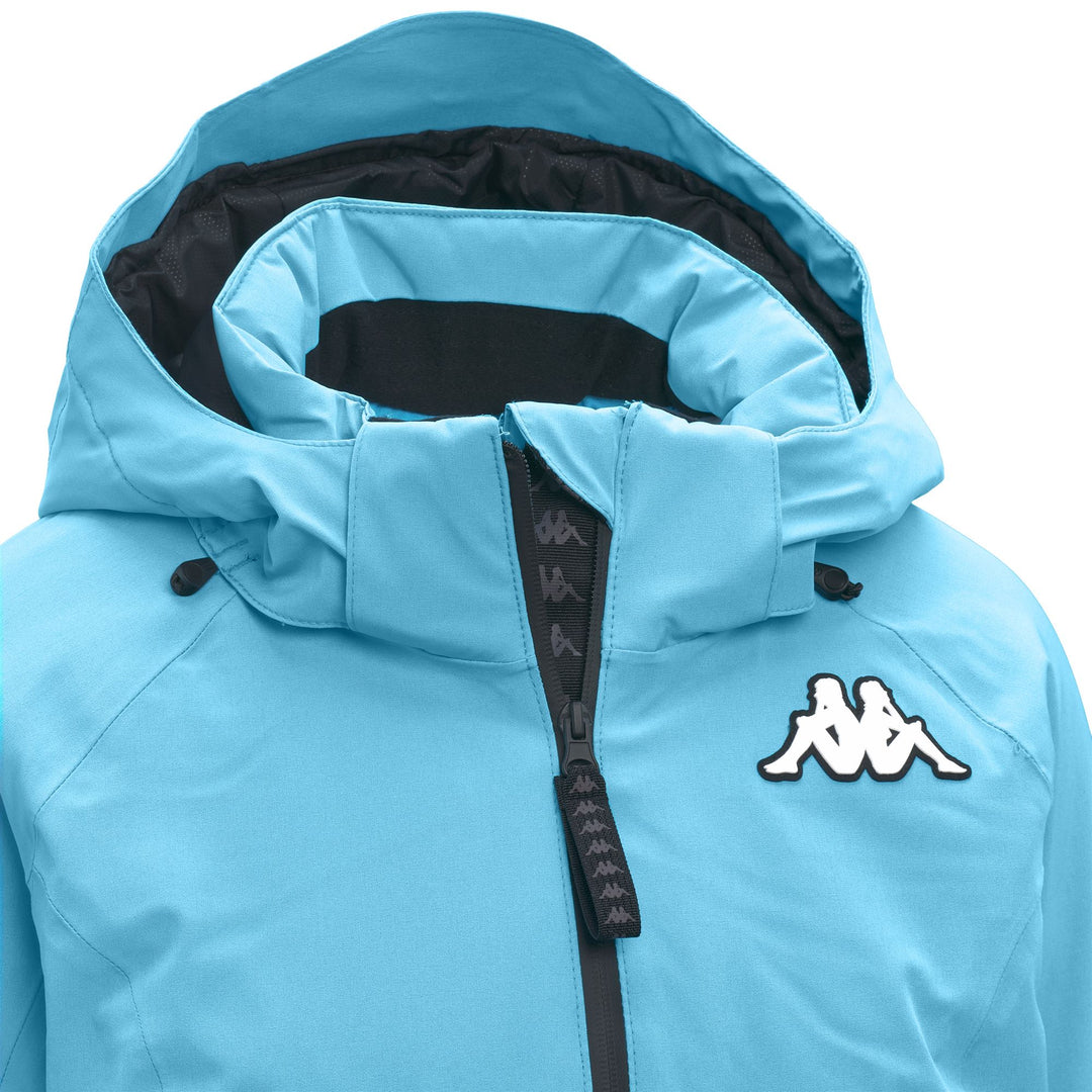 Veste de ski rembourrée bleue pour femme, coupe ajustée, avec protection imperméable main