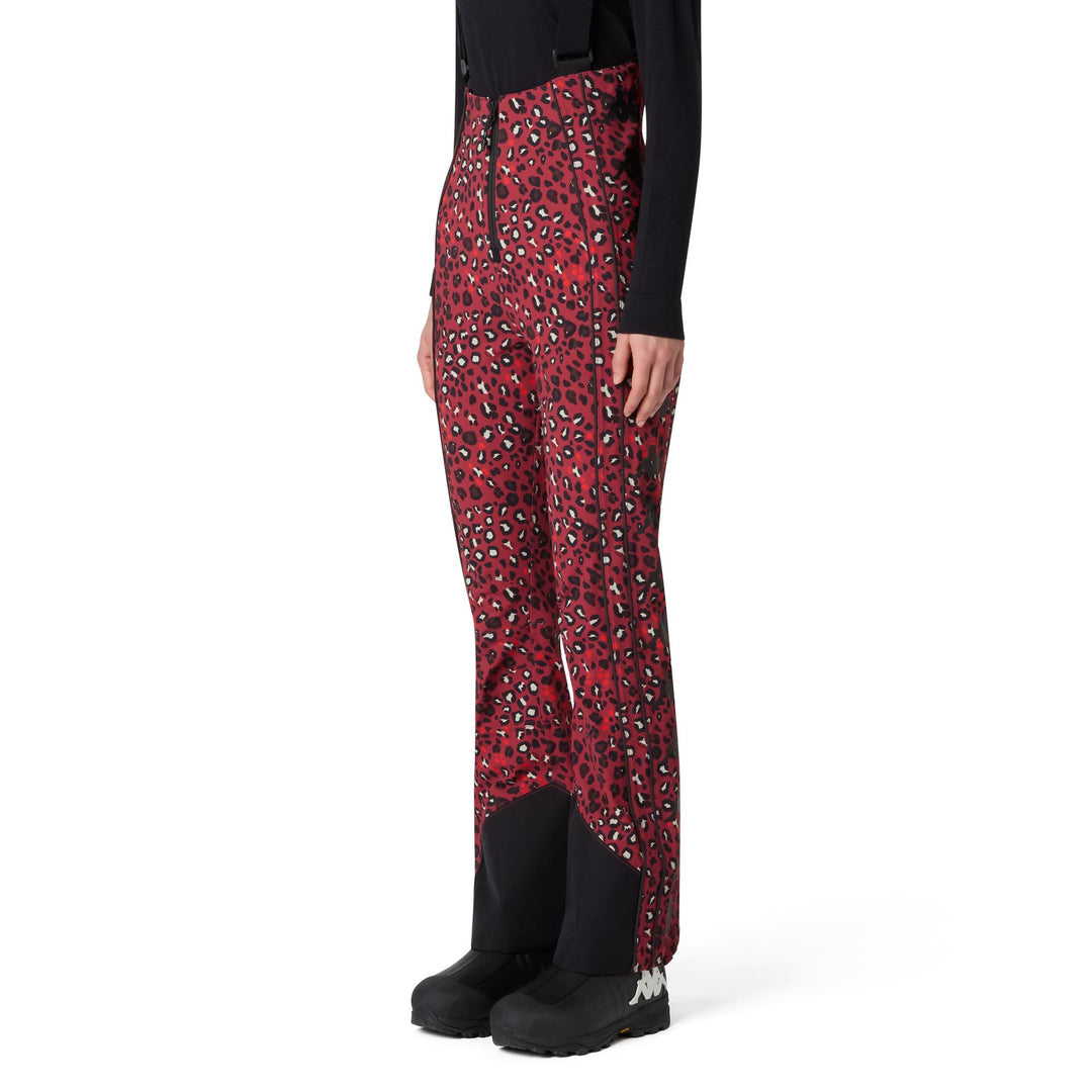 Pantalones de esquí rojos de talle alto para mujer con tejido impermeable. 01