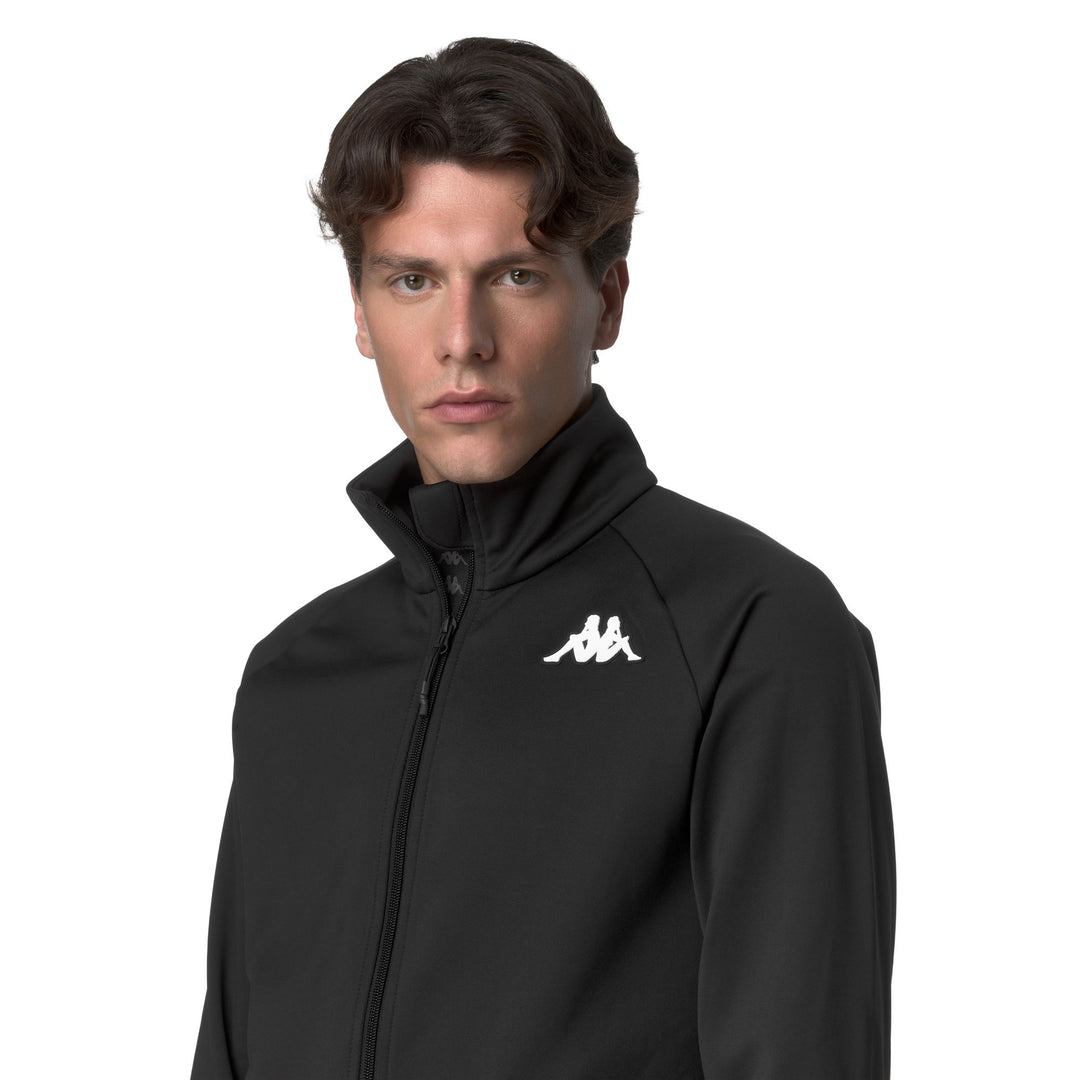 Chaqueta polar unisex negra de corte entallado main