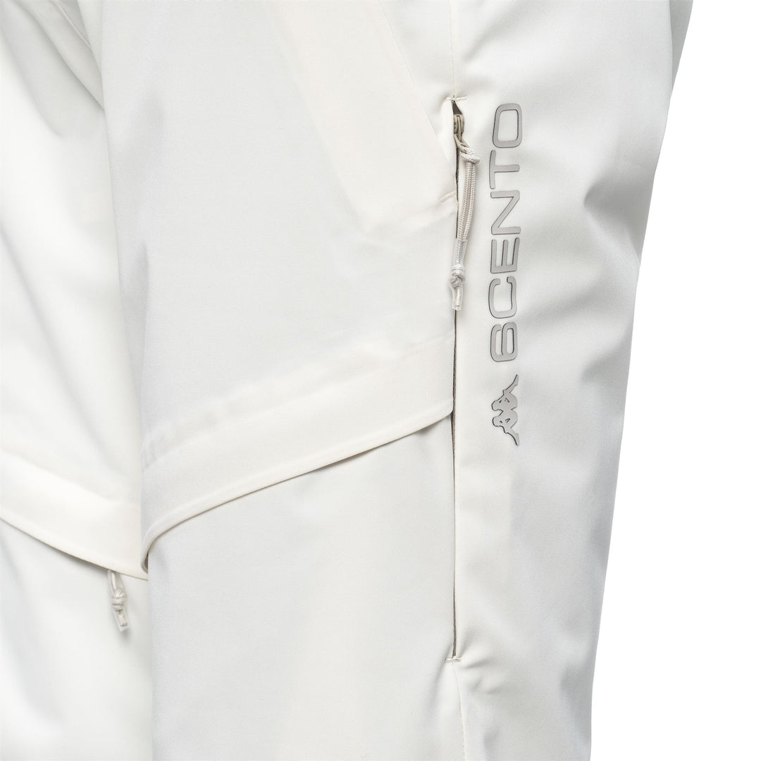 Pantalon de ski blanc pour femme, imperméable et isolant. main