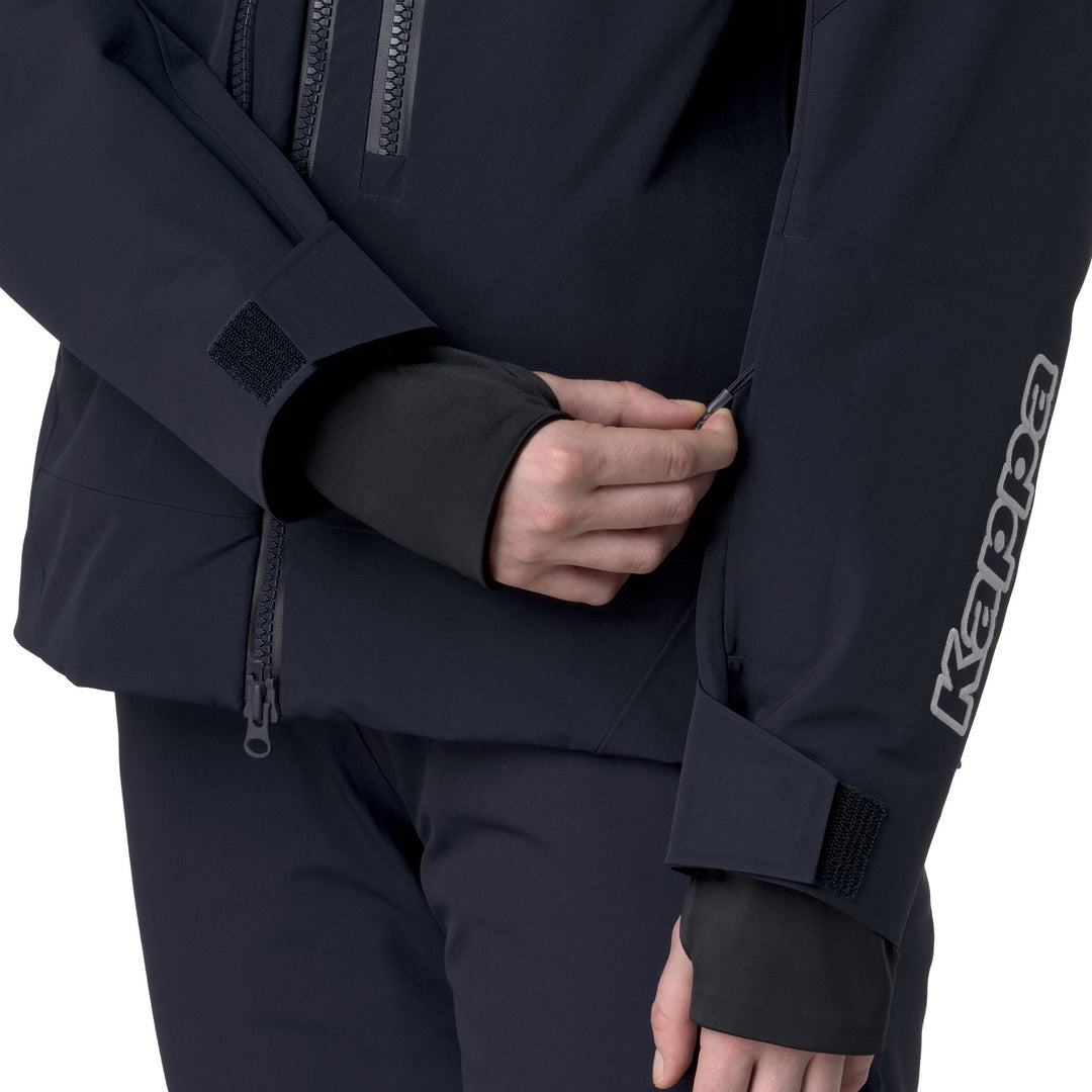 Veste de ski matelassée bleue pour femme avec protection imperméable main