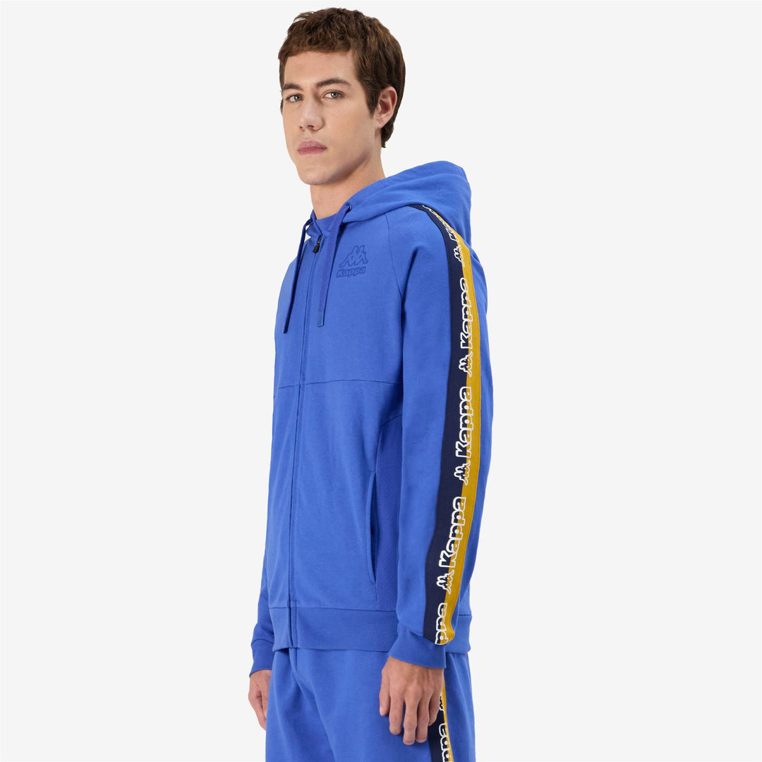 Chaqueta polar deportiva azul real para hombre con capucha y bolsillos main