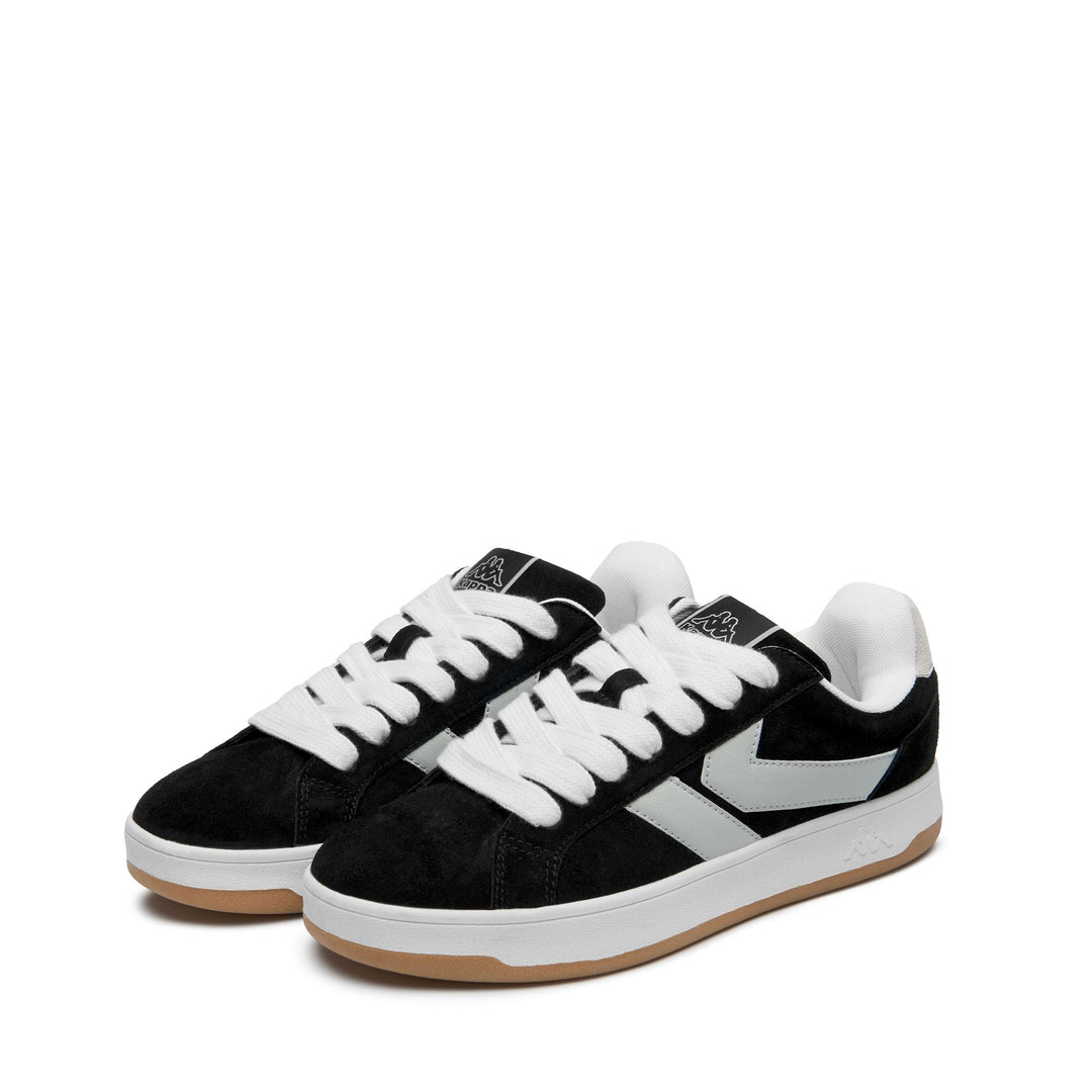 Zapatillas unisex negras de corte bajo con suela de goma 01