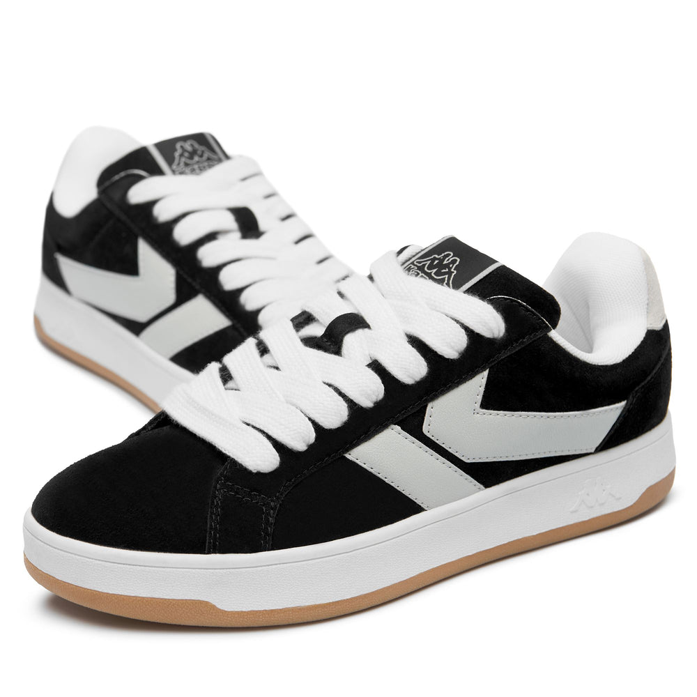 Zapatillas unisex negras de corte bajo con suela de goma 02