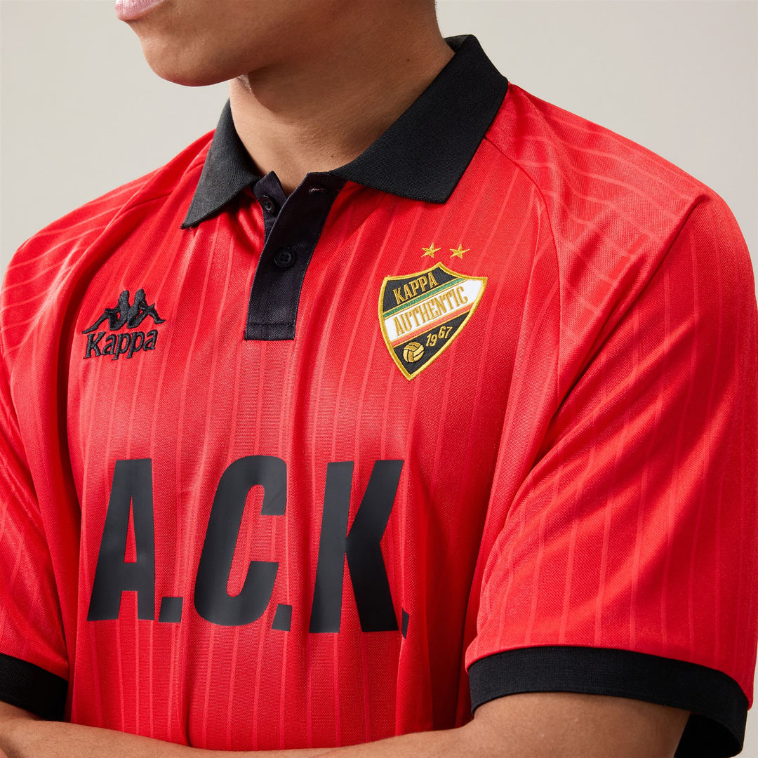 Polo rojo de corte cómodo para hombre, confeccionado en tejido jacquard. 01