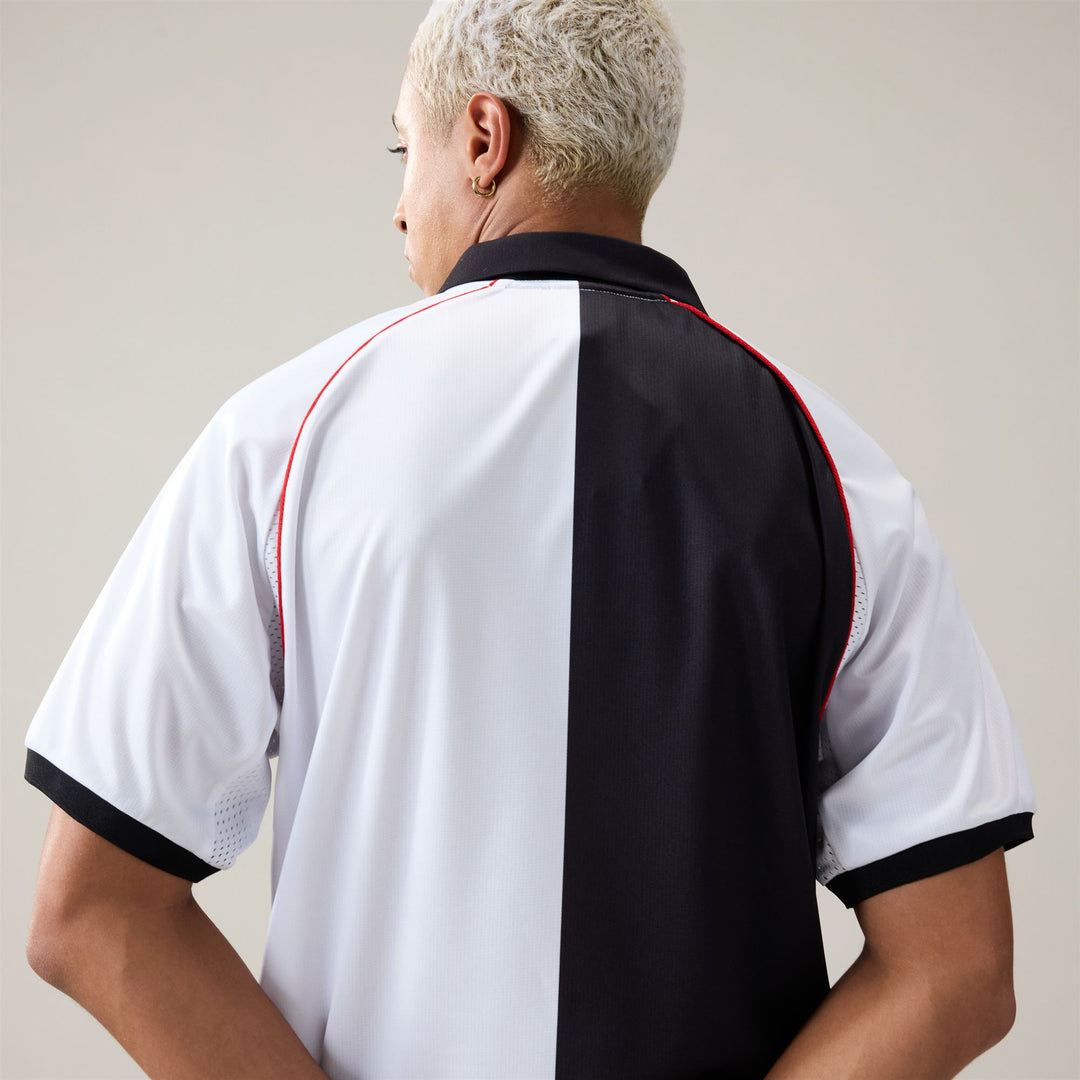 Polo de sport blanc pour homme, coupe confortable et empiècements en mesh main