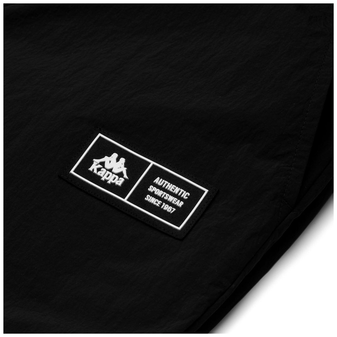 Pantalones cortos deportivos negros de calle para hombre con cintura elástica y bolsillos main