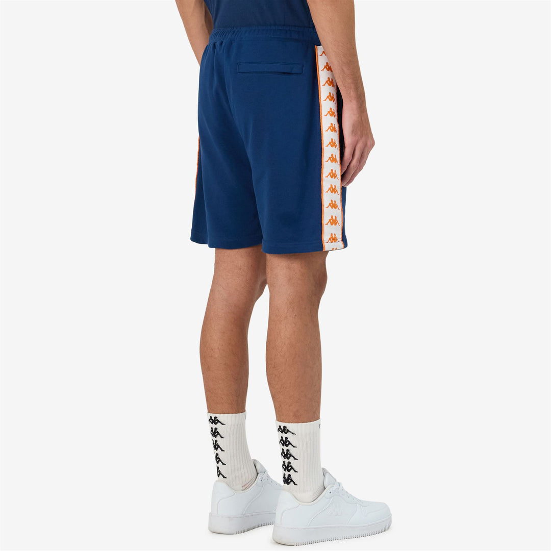 Short de sport bleu pour homme, coupe confortable, avec bande jacquard main