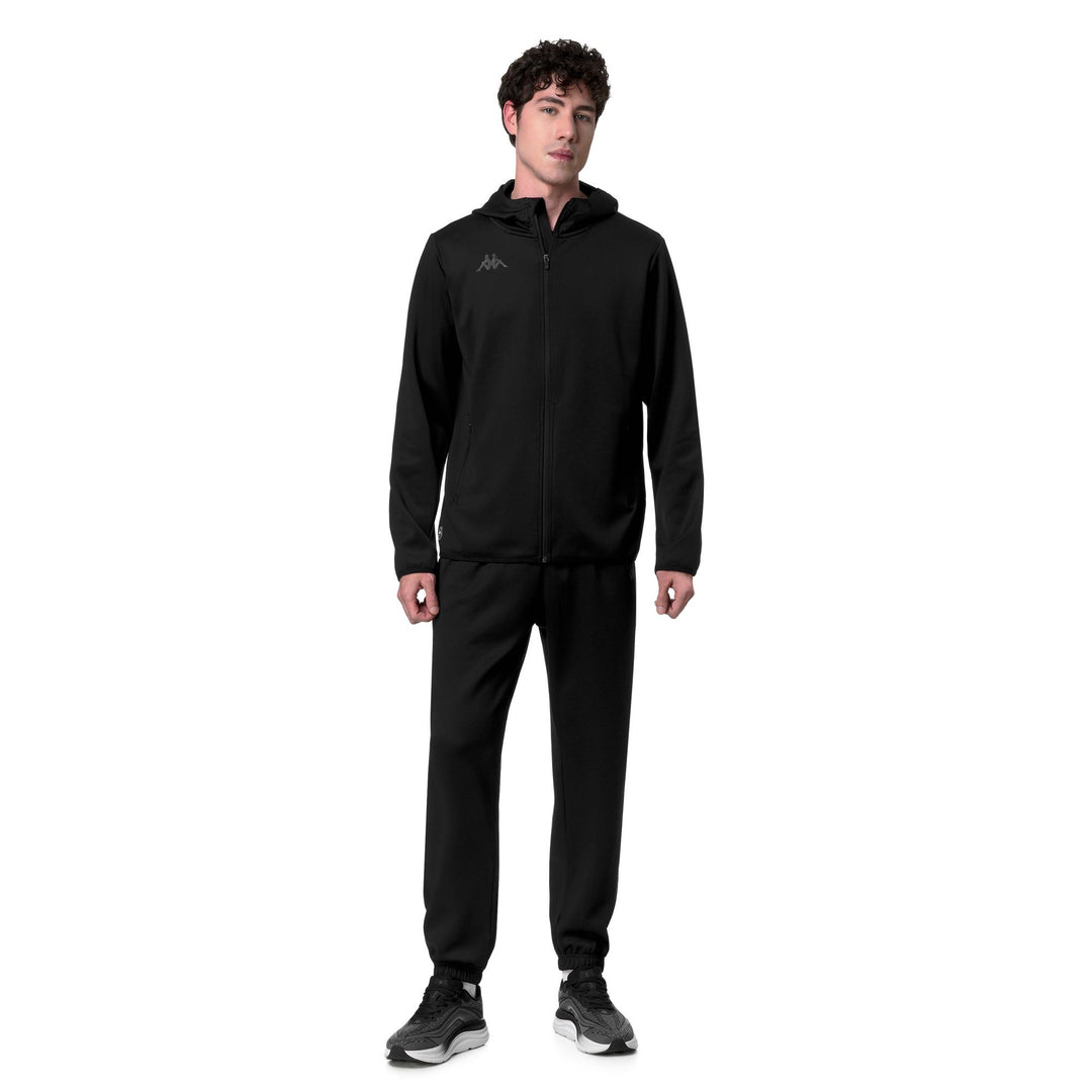 Sweat à capuche zippé noir pour homme, coupe classique, style sportswear. main