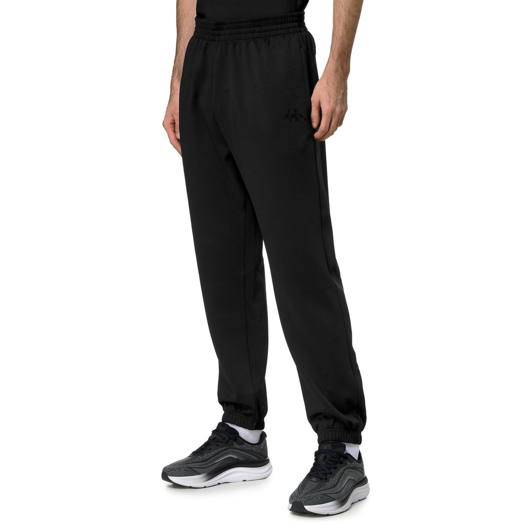 Pantalon d'entraînement noir pour homme, coupe classique, en tissu interlock main