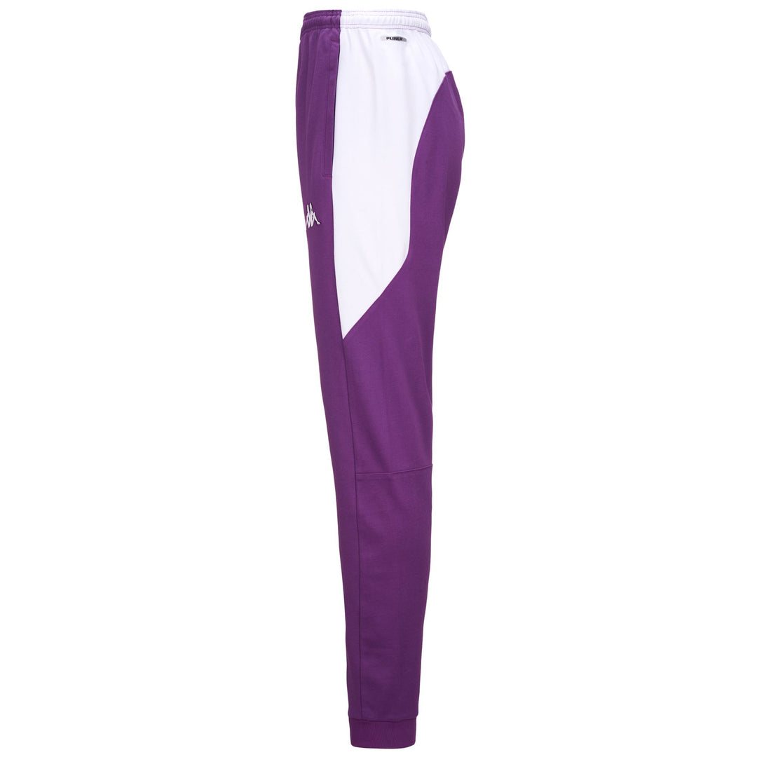 Pantalón deportivo de fútbol de corte entallado para hombre, color violeta, con bolsillos main