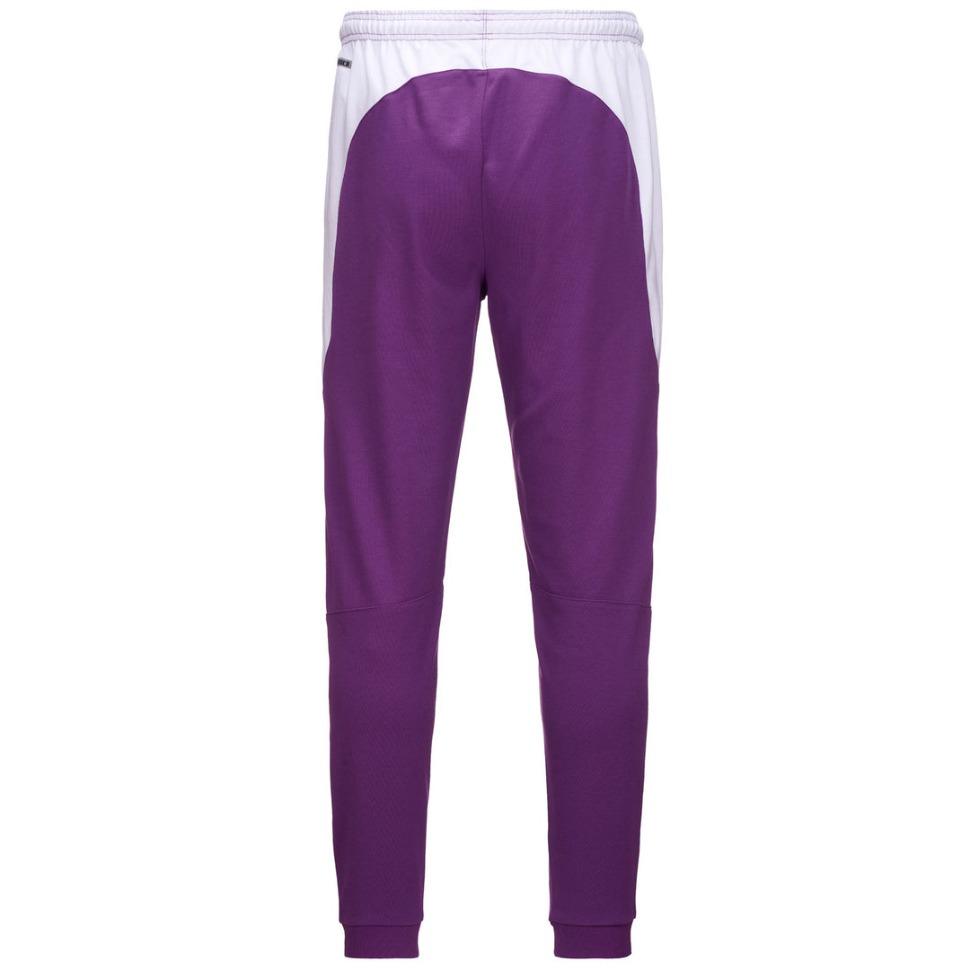 Pantalón deportivo de fútbol de corte entallado para hombre, color violeta, con bolsillos main