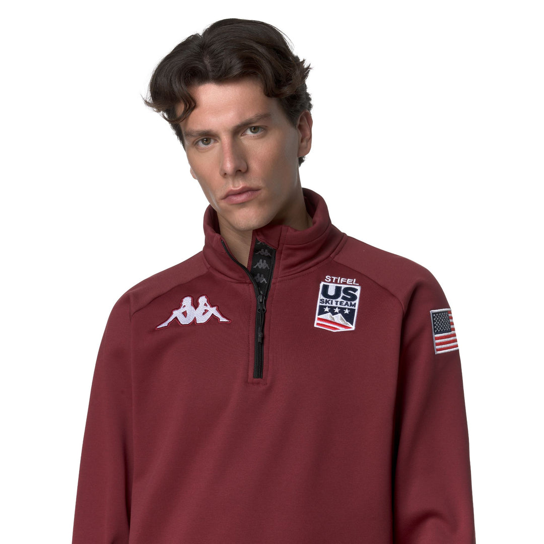 Cárdigan unisex de polar rojo con media cremallera y corte entallado main