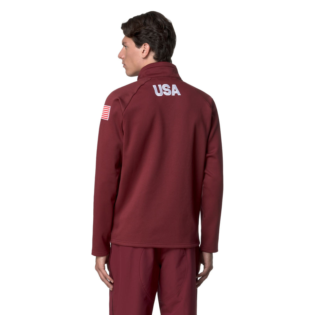 Cárdigan unisex de polar rojo con media cremallera y corte entallado main