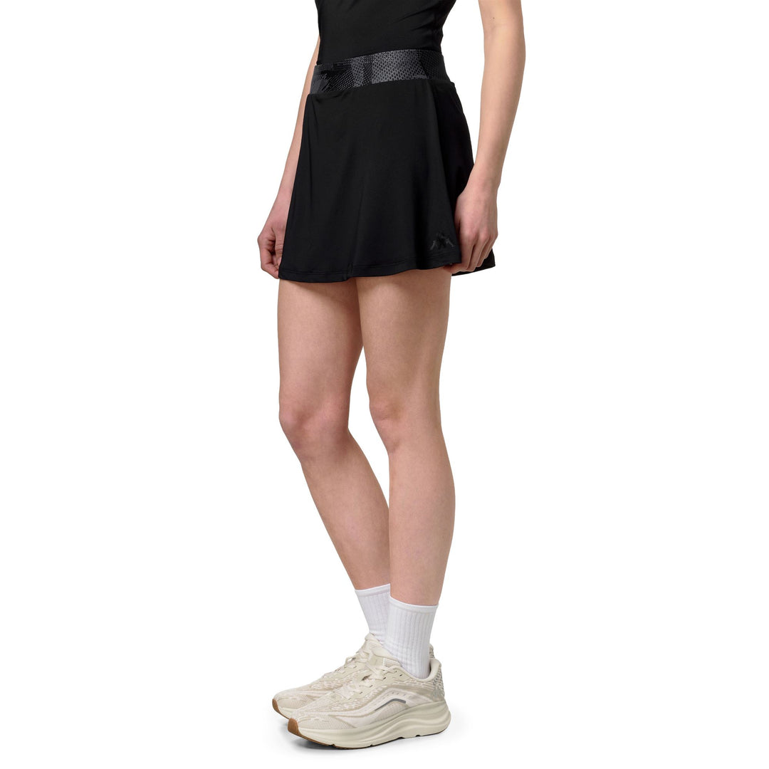 Jupe de padel noire pour femme, coupe ajustée, avec short intégré main