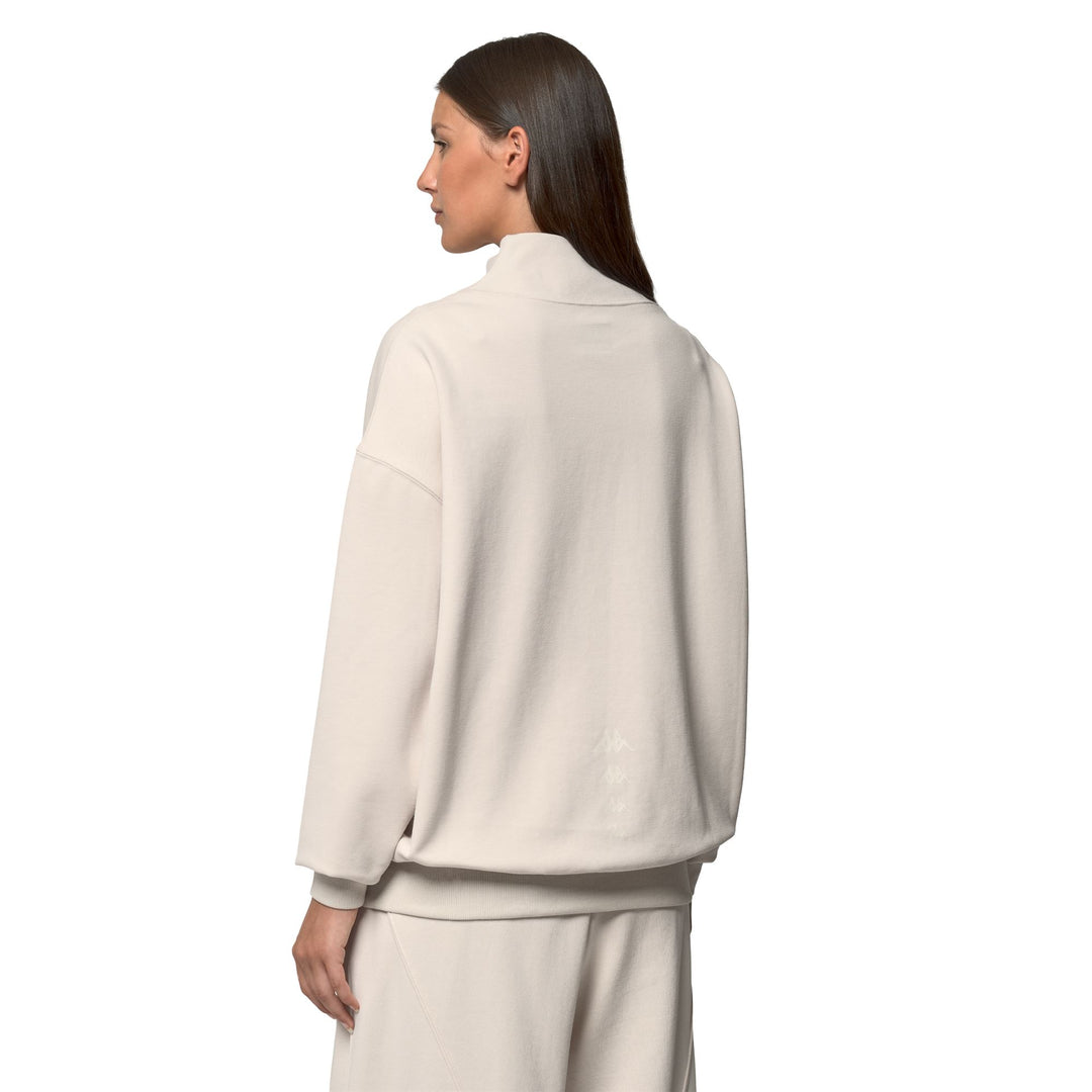 Pull polaire beige oversize pour femme avec demi-zip main
