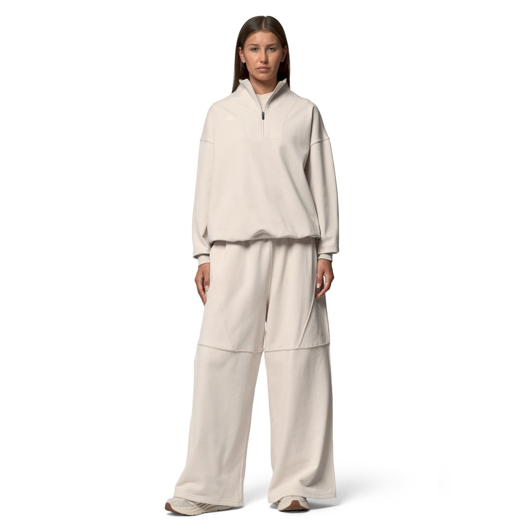 Pull polaire beige oversize pour femme avec demi-zip main