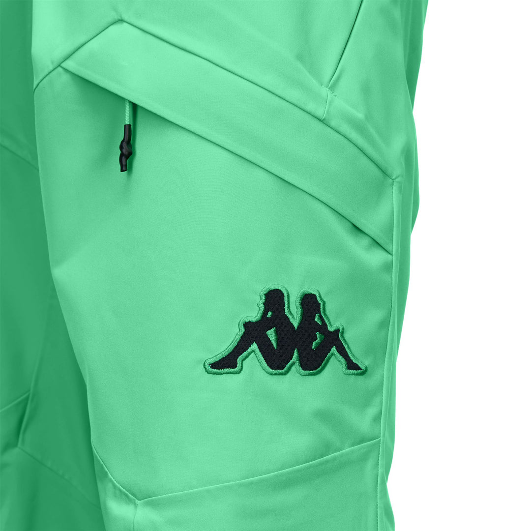 Pantalones de esquí unisex impermeables verdes con aislamiento y polainas main