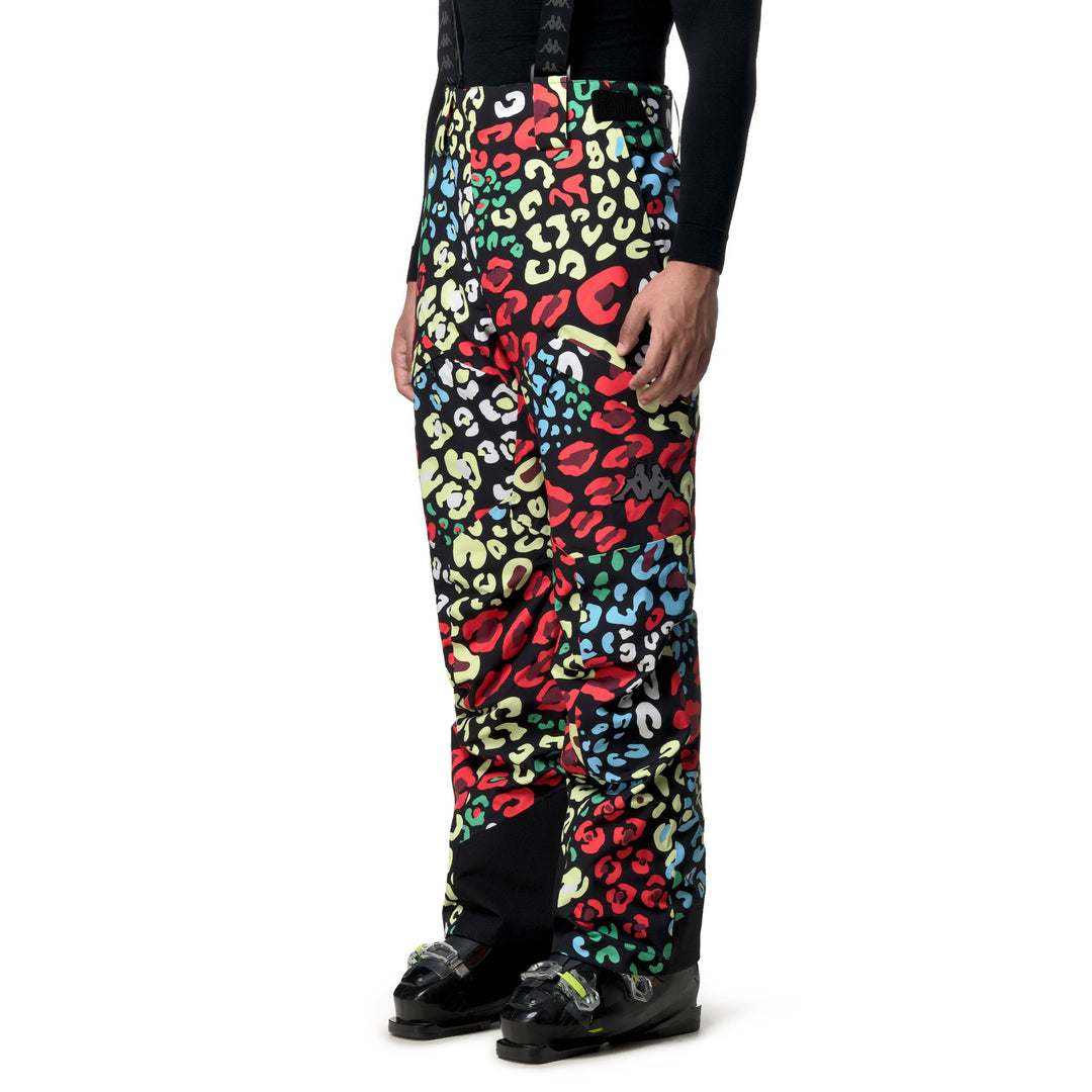 Pantalón deportivo unisex impermeable negro y naranja con acolchado 01