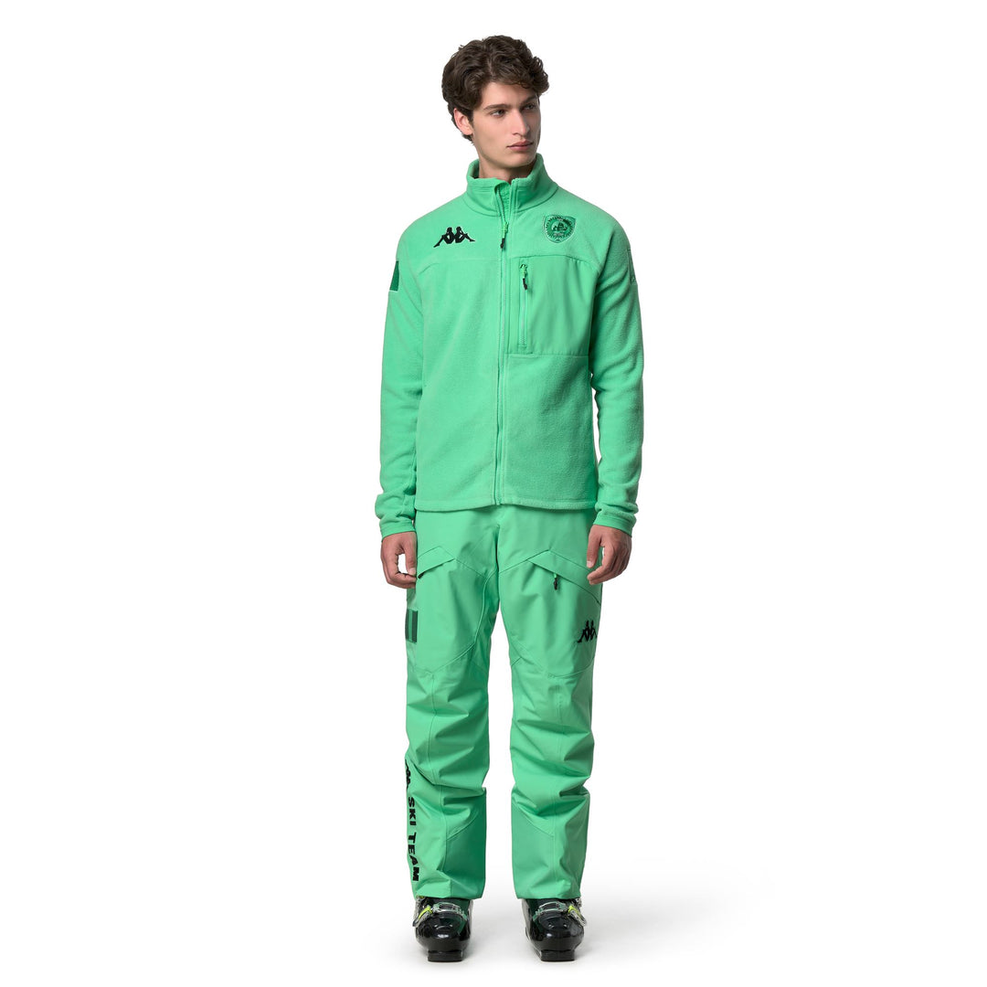 Polaire de ski unisexe verte avec empiècements extensibles et poches zippées 01