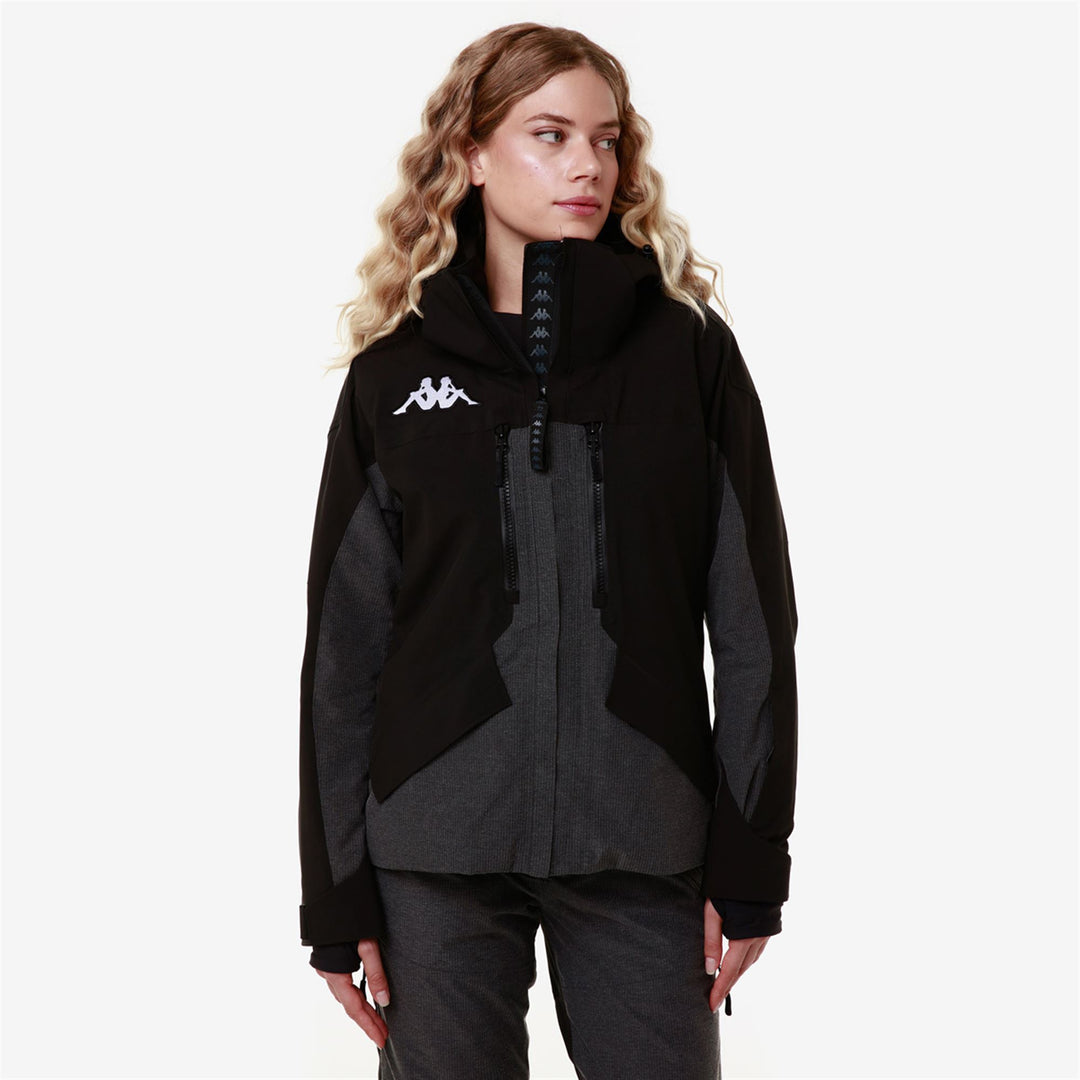 Veste de ski matelassée noire pour femme avec technologie imperméable main