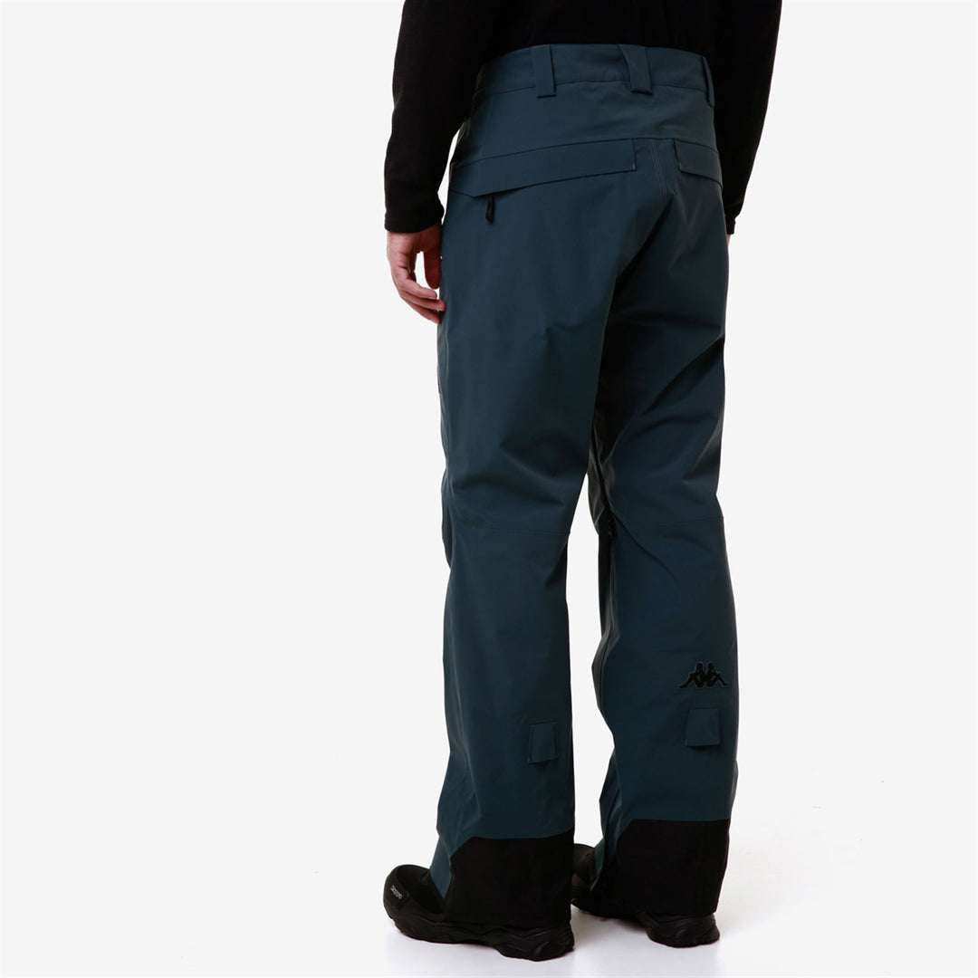 Pantalon de ski gris pour homme, coupe oversize, avec protection contre l'eau et le froid. main