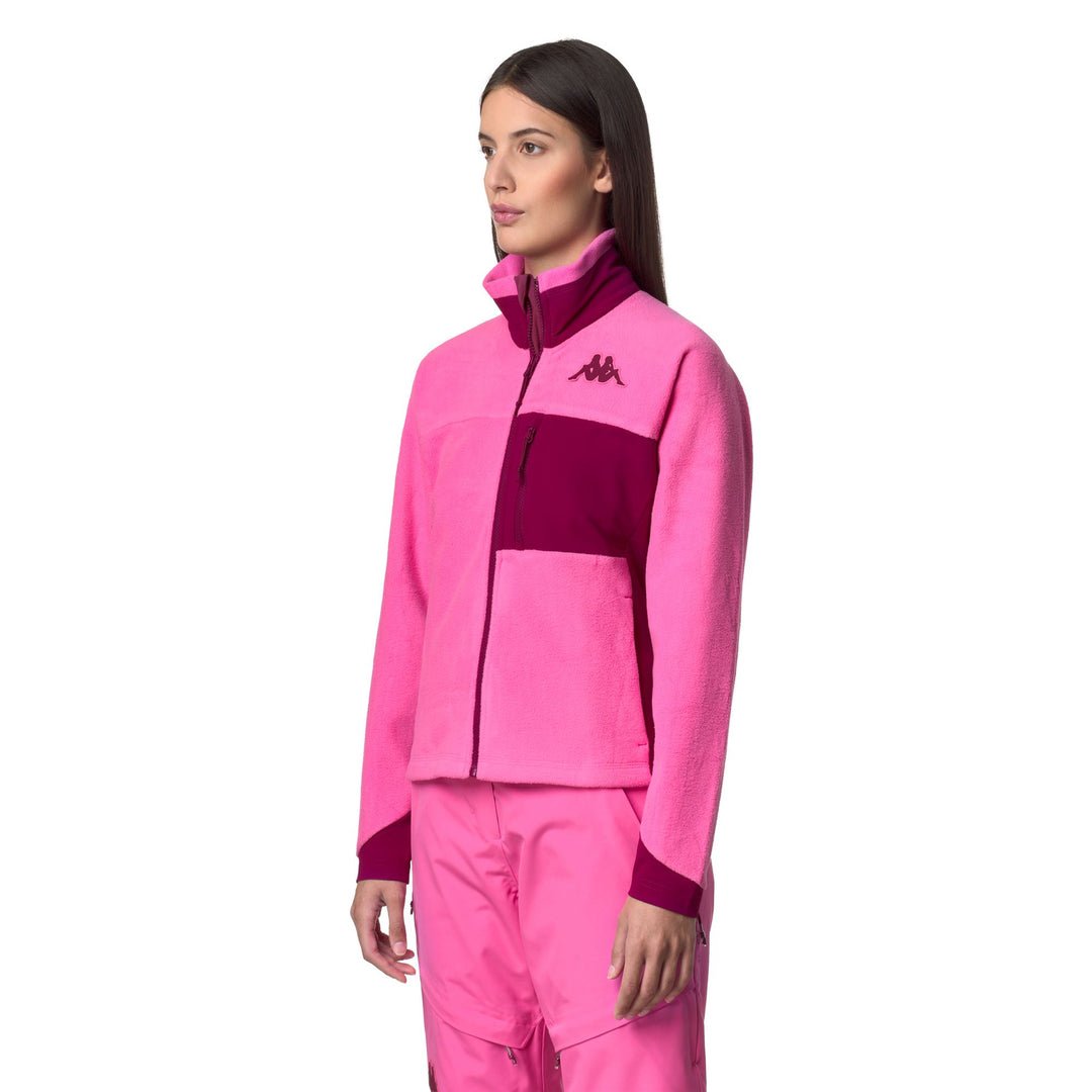 Giacca in pile da donna fucsia rossa con tasche con cerniera main