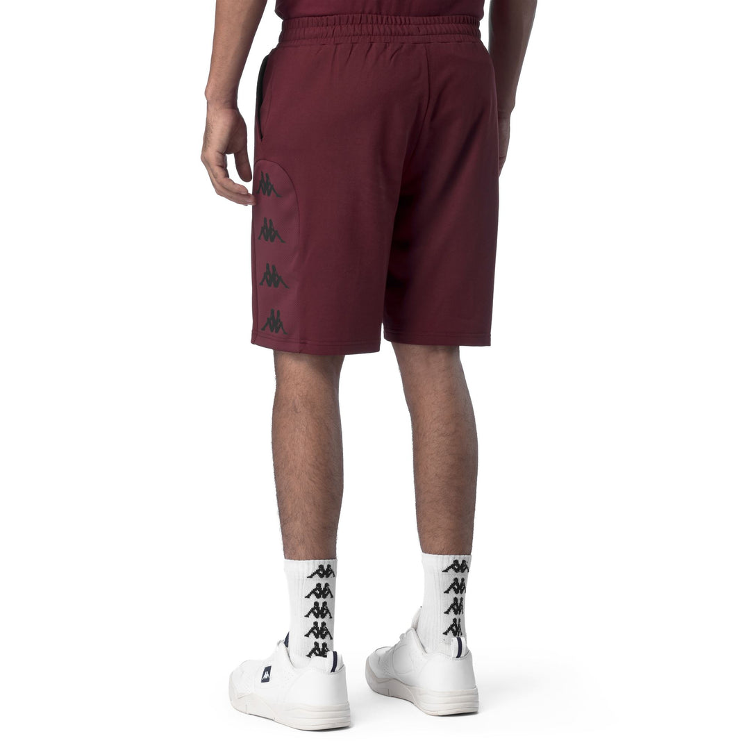 Pantalones cortos deportivos rojos de corte regular para hombre en tejido French Terry con inserción de malla main