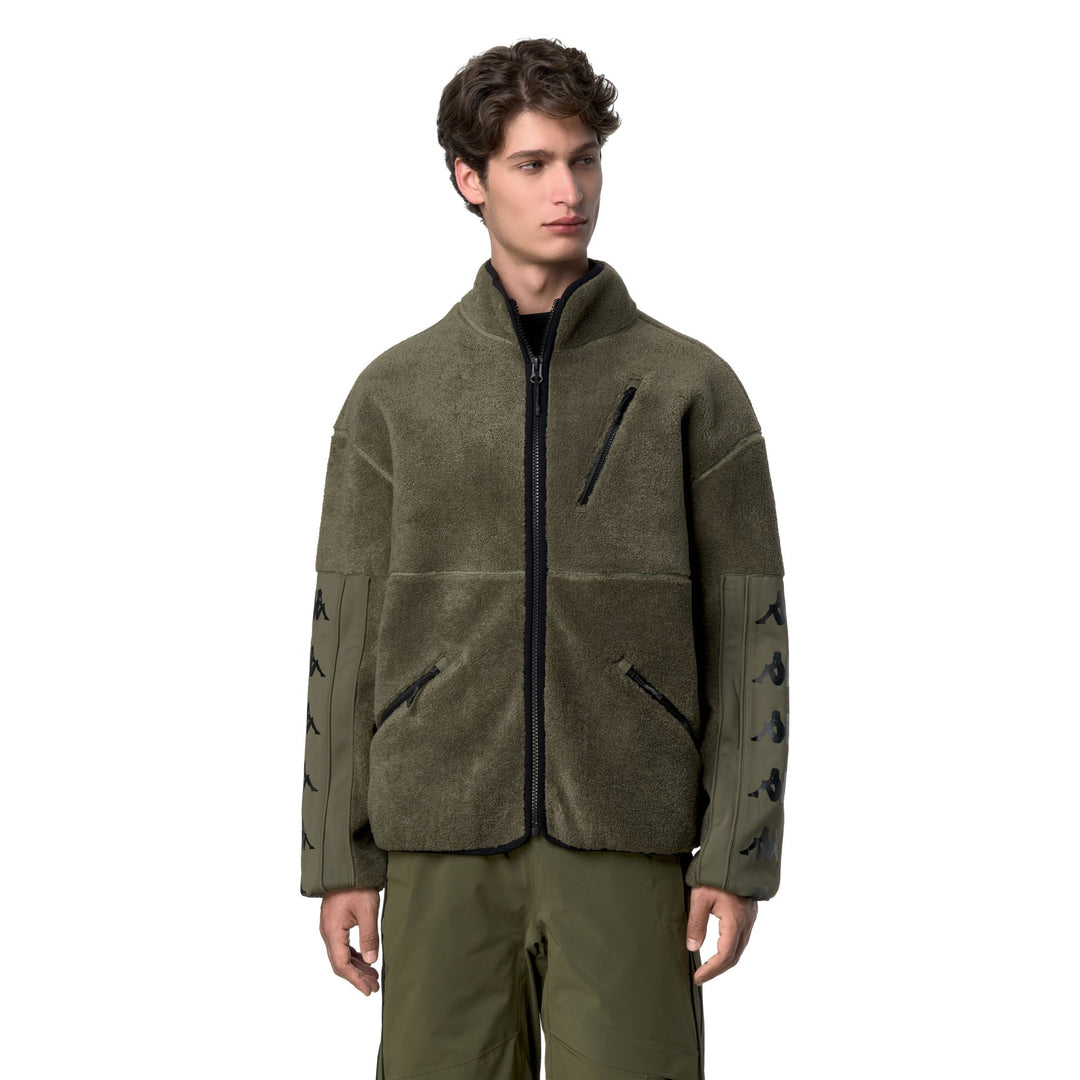 Giacca in pile unisex verde con inserti elasticizzati per lo sci main