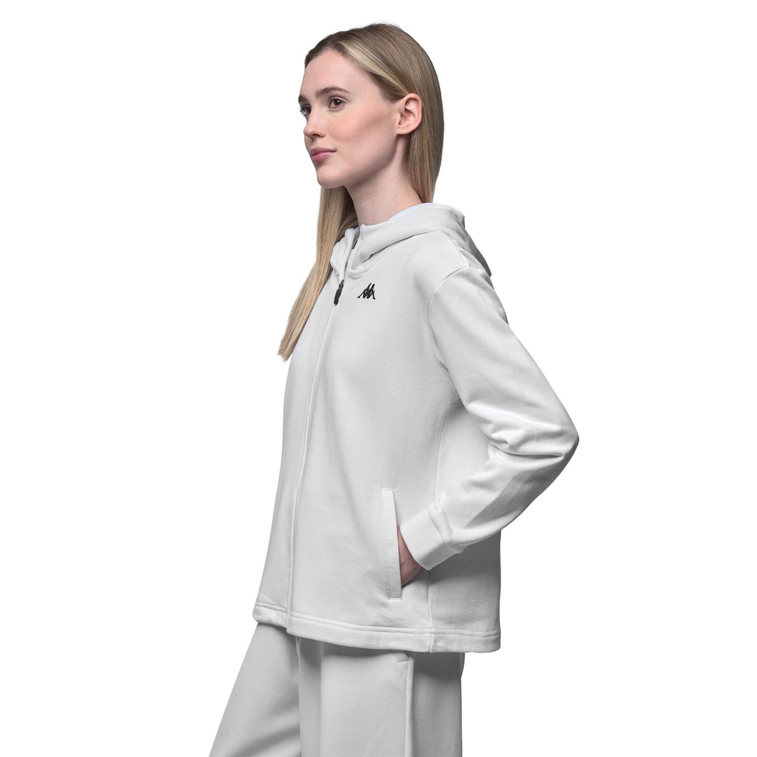 Felpa sportiva da donna bianca a vestibilità regolare con zip intera e inserti in rete. main