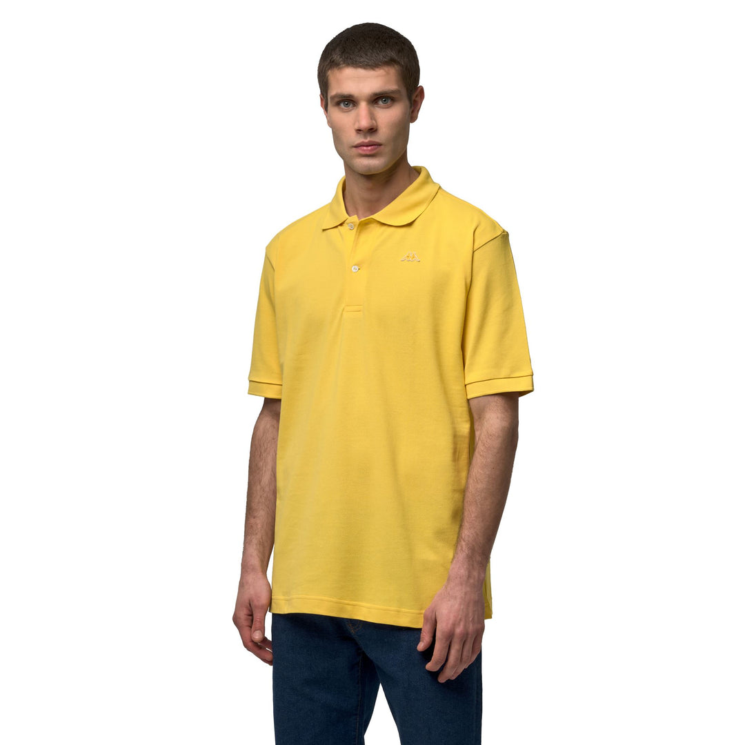 Polo jaune en coton coupe classique pour homme main